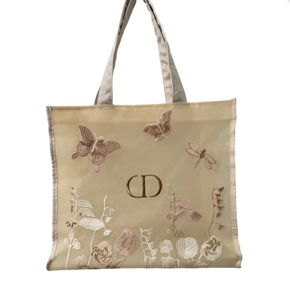 Stylish Dior Beauty GWP tote.
Cream Lace tote with embroidered buttertly - Picture 6 of 14